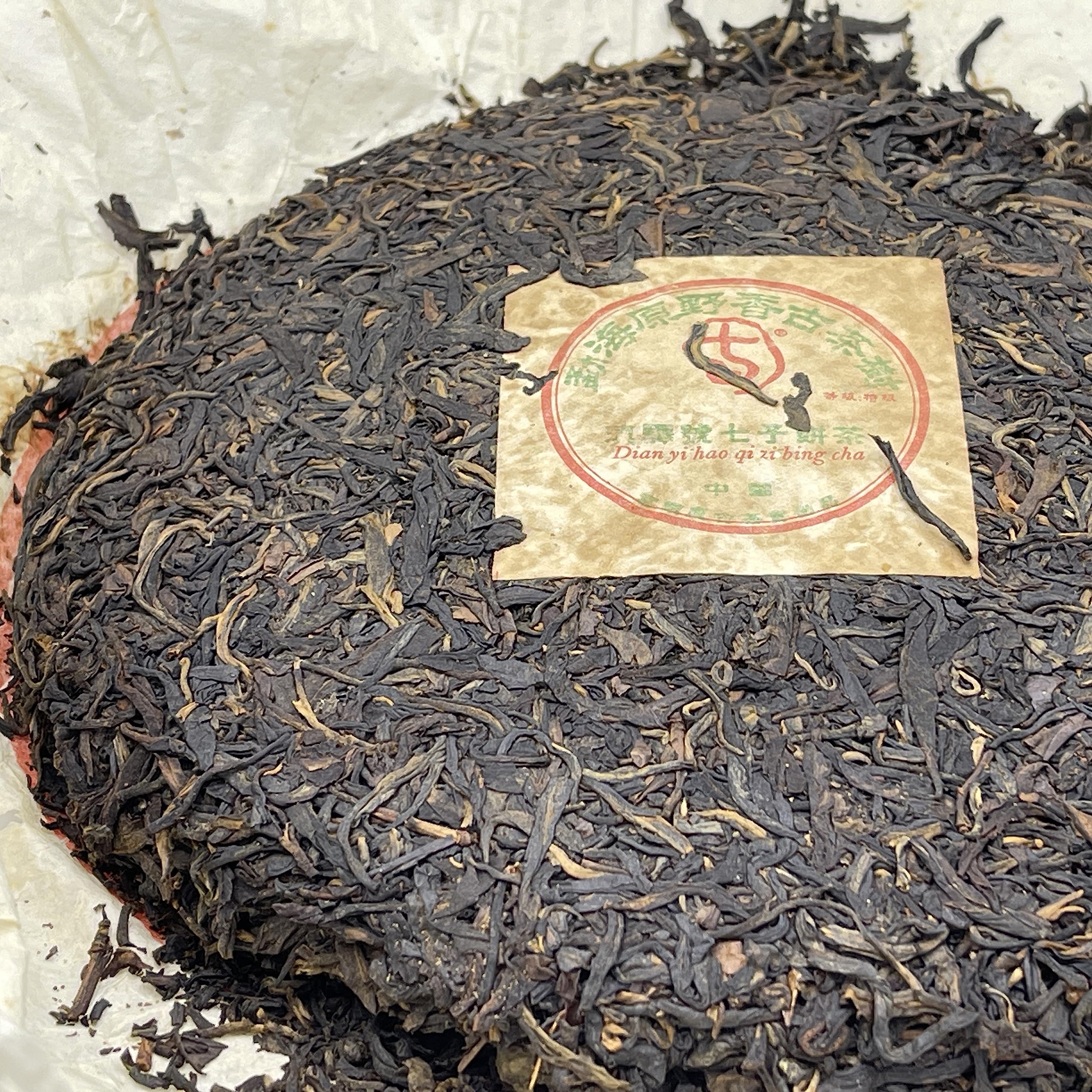 2004 Dian Yi Hao Menghai Wild Fragrance Ancient Tree Raw Pu-erh Tea Cake, 400g, from Yunnan