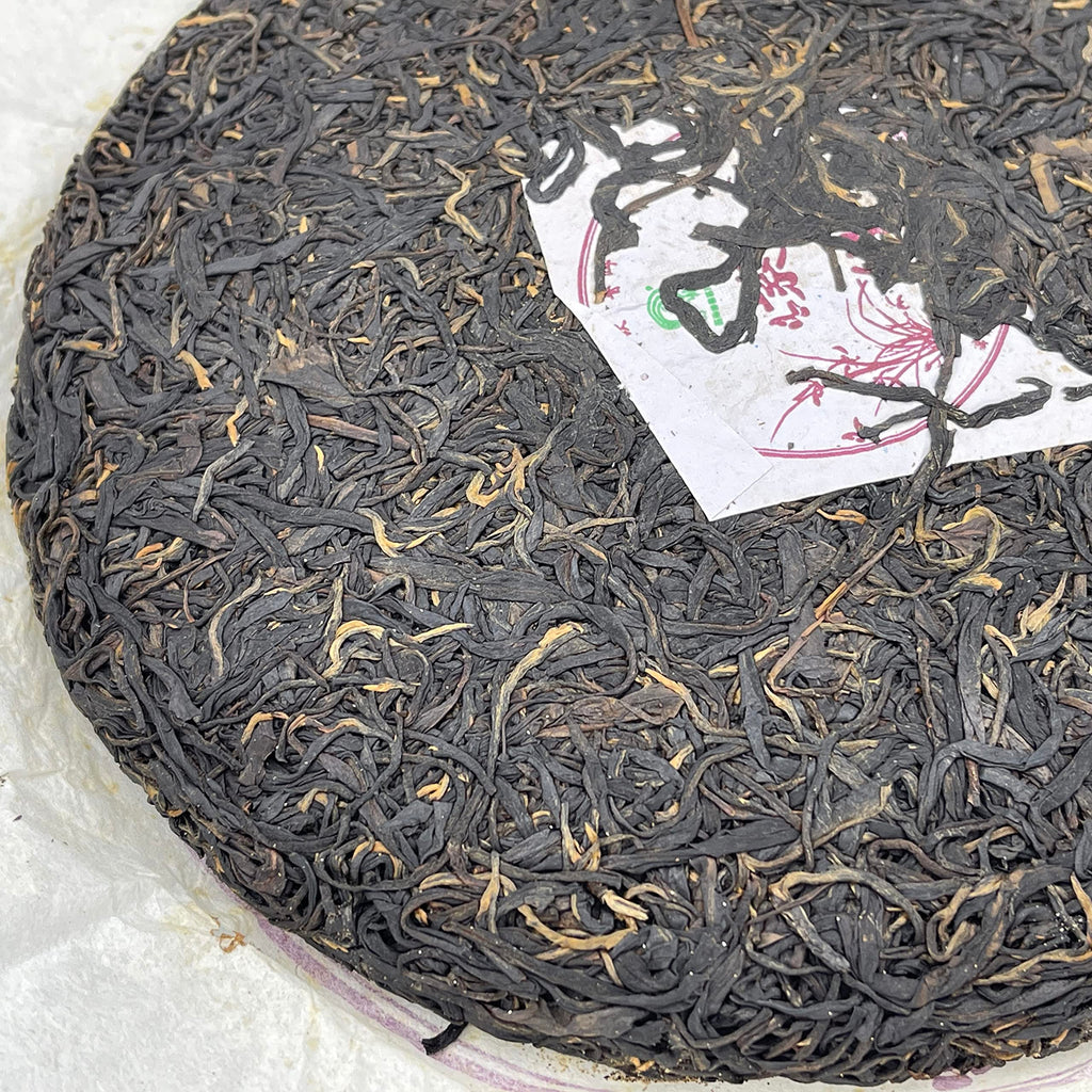 Xishuangbanna Purple Juan 2012 Raw Pu-Erh Tea Cake 400g