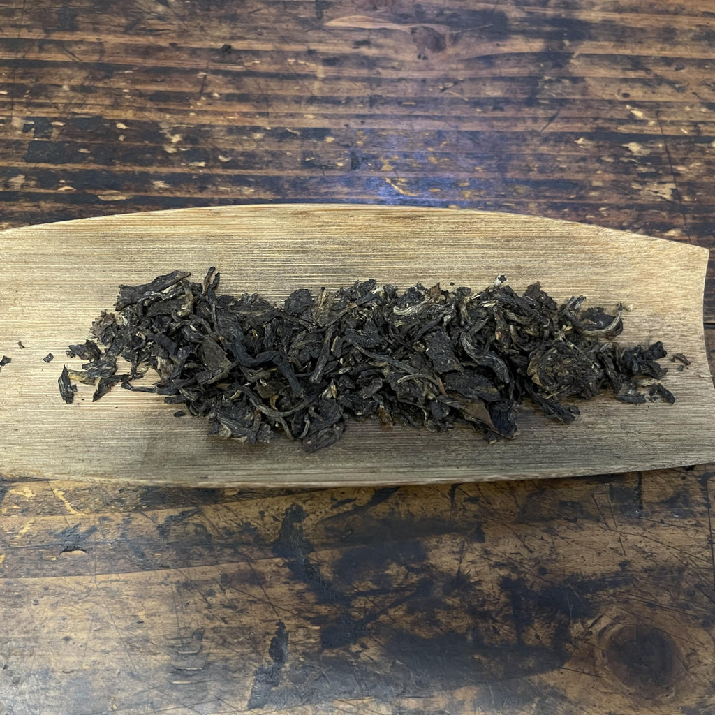 2005 Shuangjiang Mengku Handmade Ancient Tree Raw Pu-erh Tea 357g