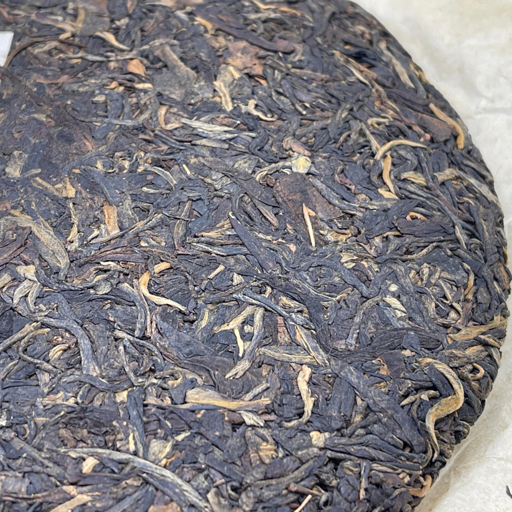 Pu-Erh tea,Late 1990s,Hong Kong customization Orange Flying Seal-Little Yellow Seal,357g,Raw