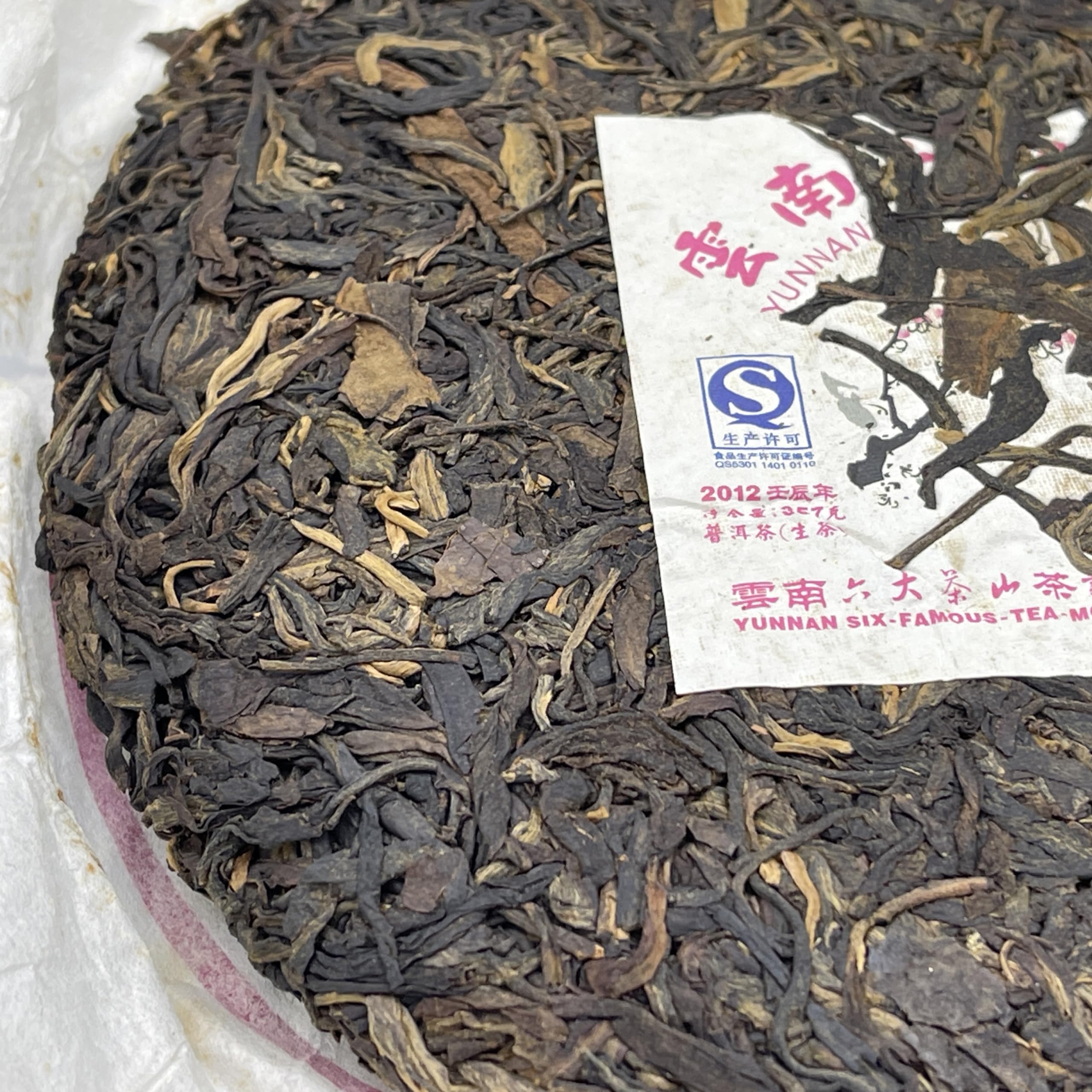 Pu-Erh tea,2012,SIX FAMOUS TEA MOUNTAIN,Plum Blossom,357,Raw