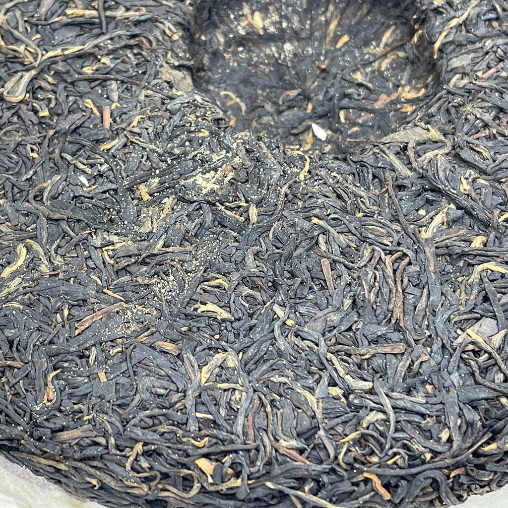 Xishuangbanna Purple Juan 2012 Raw Pu-Erh Tea Cake 400g