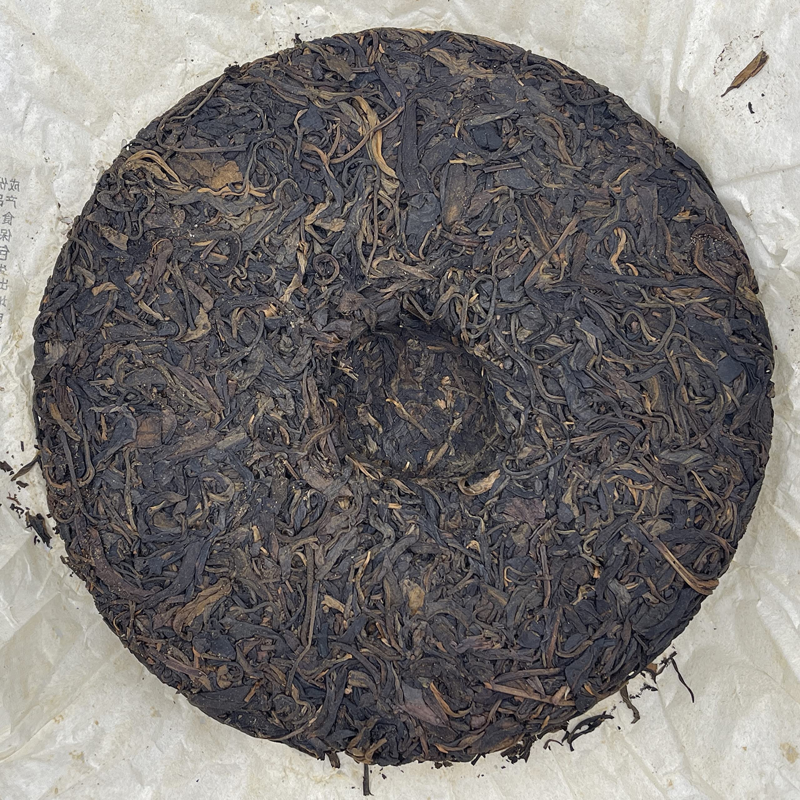 2006 Yiwuzheng Mountain Wild Raw Pu-erh Tea Cake, 380g