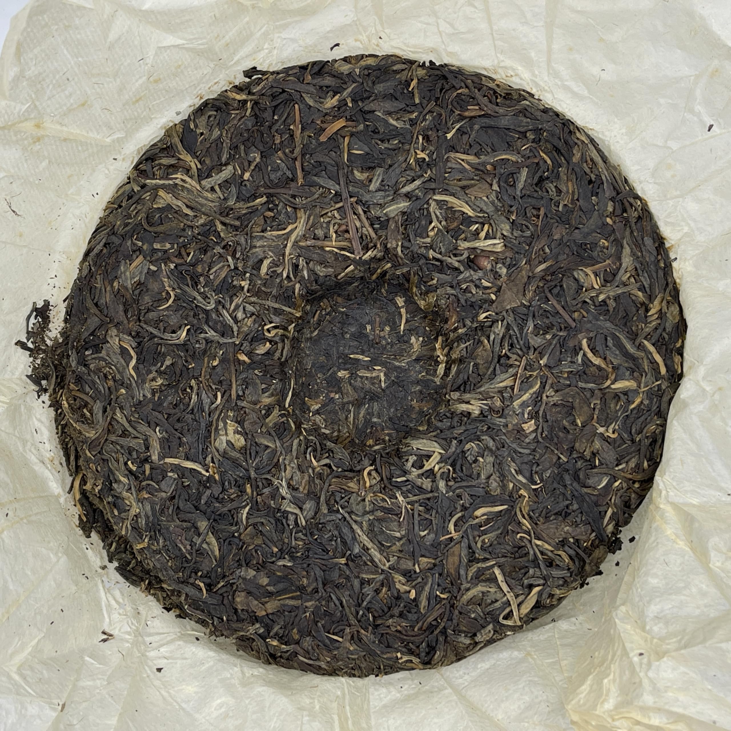 Yiwu Tongqing Hao Qiaomu Ancient Tree Raw Pu-Erh Tea 2003 – 357g
