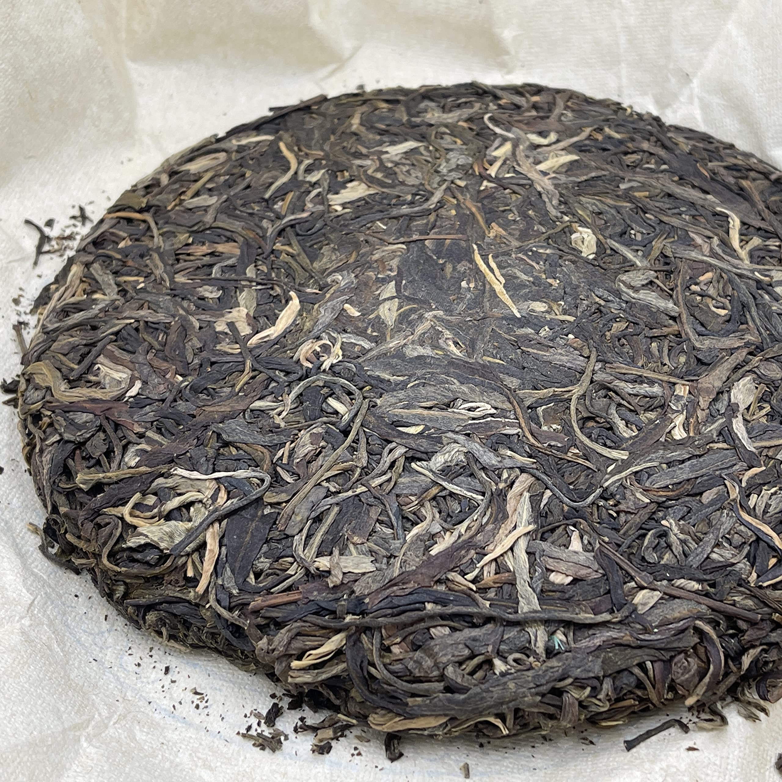 Sheng Jia Yuan Molie 2012 Raw Pu-Erh Tea Cake 357g