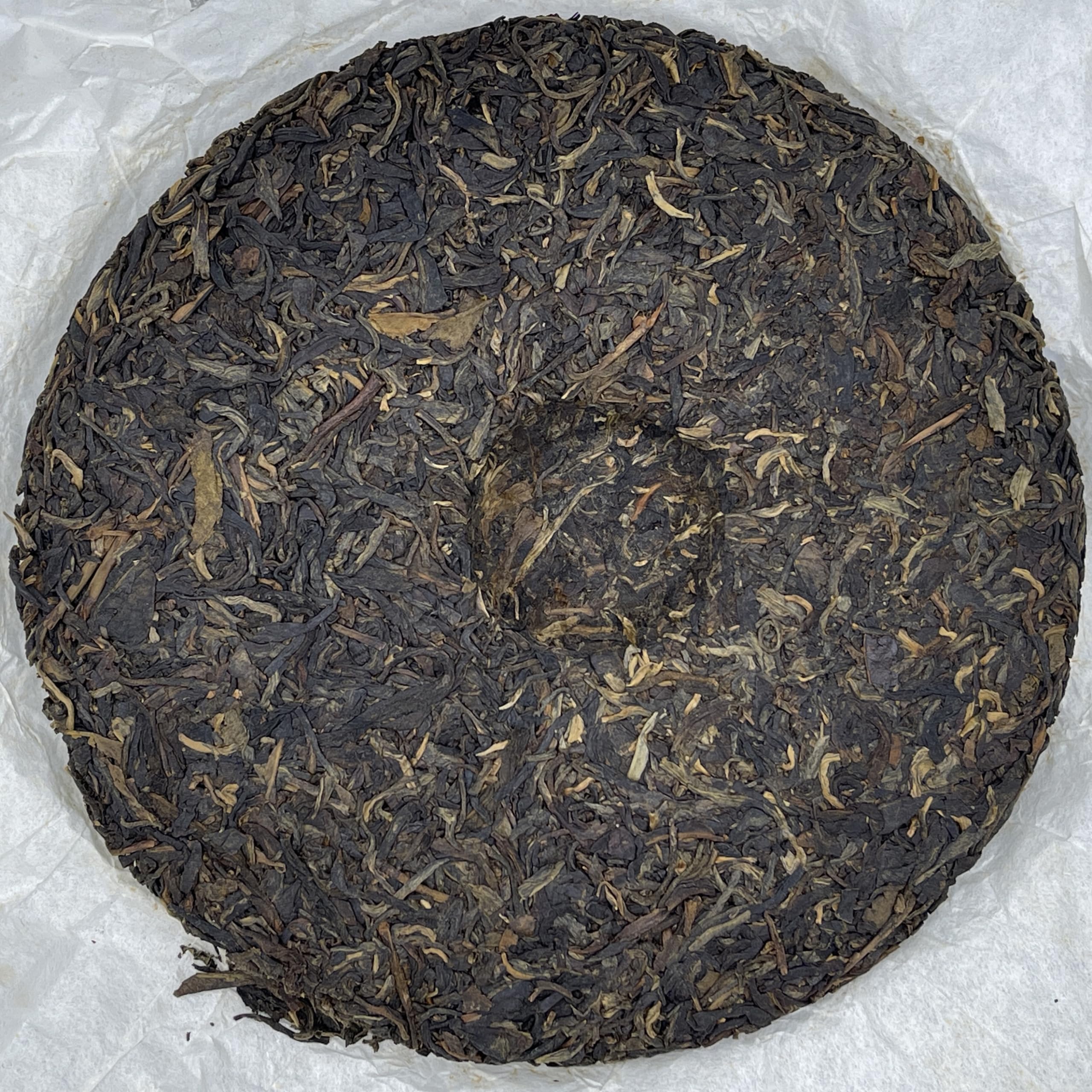 Pu-Erh tea,2012,SIX FAMOUS TEA MOUNTAIN,Plum Blossom,357,Raw